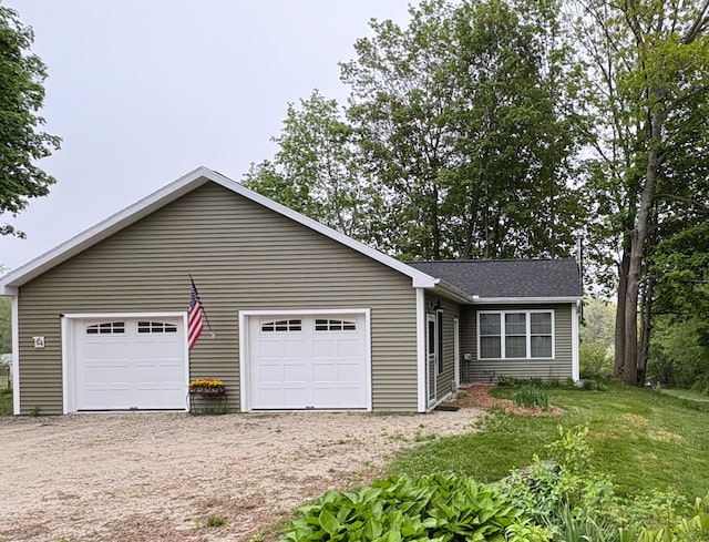 52-54 High St, North Berwick, ME 03906 - ranch-style house featuring dirt driveway, a shingled roof, and an attached garage