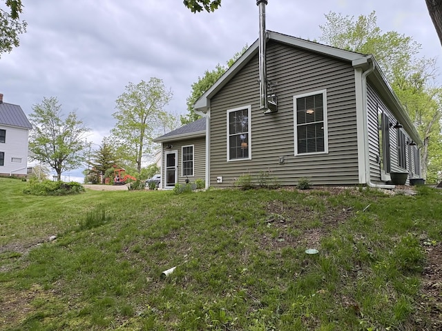 52-54 High St, North Berwick, ME 03906 - rear view of house featuring a lawn