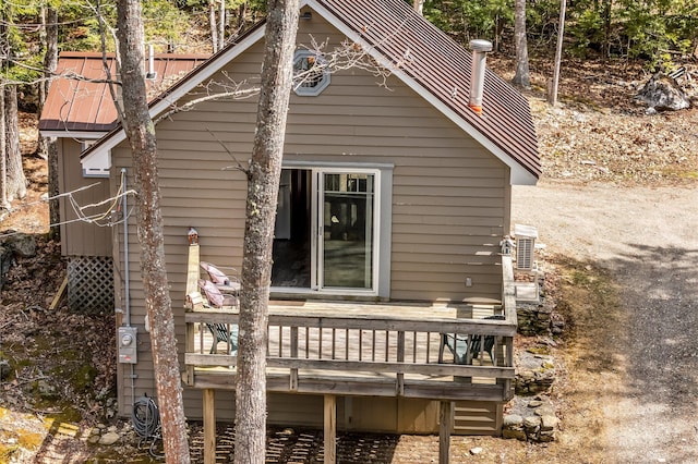 76 Cottage Shore Dr, Holden, ME 04429 - back of property with a wooden deck