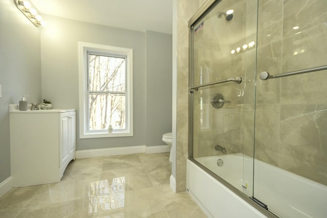27 Church St, Livermore Falls, ME 04254 - full bath with baseboards, a wealth of natural light, toilet, and enclosed tub / shower combo