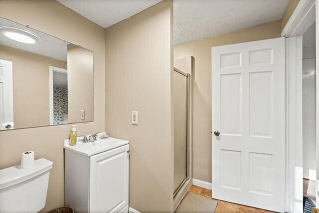 5 Paddy Creek Rd Unit 5, Kennebunkport, ME 04046 - full bathroom featuring a stall shower and vanity