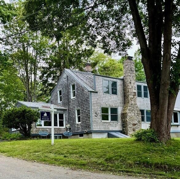 5 Paddy Creek Rd Unit 5, Kennebunkport, ME 04046 - view of front of house featuring a chimney and a front yard