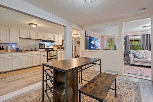 395 Hatch Rd, Auburn, ME 04210 - dining area featuring light wood-type flooring