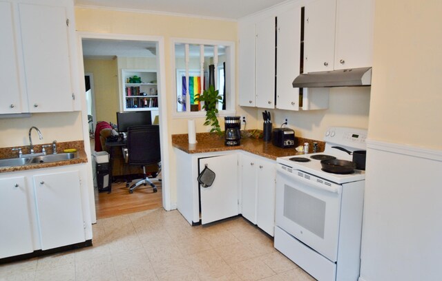 28 Cutts St, Biddeford, ME 04005 - kitchen featuring electric range, under cabinet range hood, white cabinetry, ornamental molding, and dark countertops