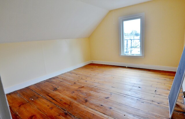 28 Cutts St, Biddeford, ME 04005 - additional living space featuring lofted ceiling and hardwood / wood-style flooring