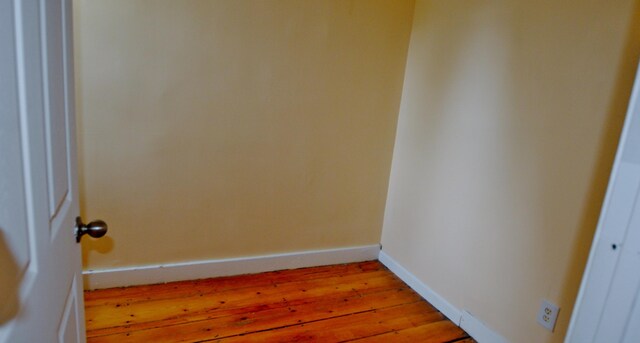 28 Cutts St, Biddeford, ME 04005 - empty room with light wood-type flooring and baseboards
