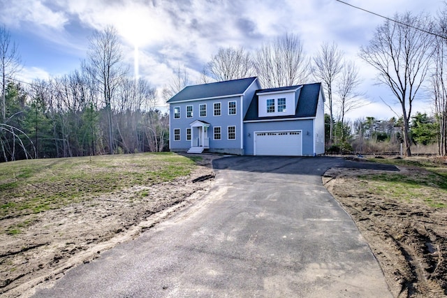 48 Highland Ave, Scarborough, ME 04074 - colonial home with driveway and a garage