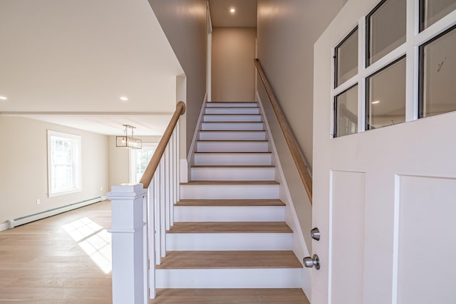 48 Highland Ave, Scarborough, ME 04074 - stairway with a baseboard heating unit, wood finished floors, and recessed lighting