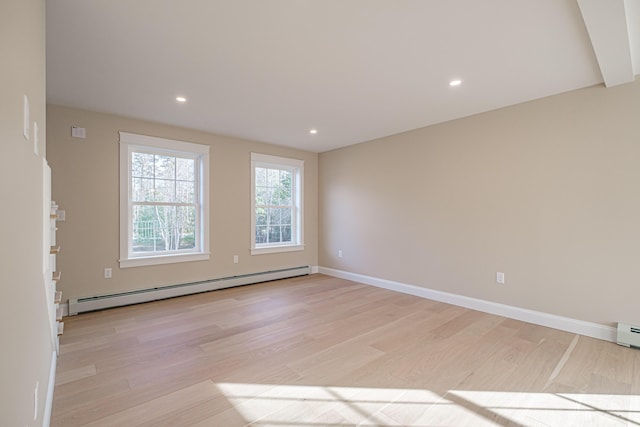 48 Highland Ave, Scarborough, ME 04074 - unfurnished room with a baseboard heating unit, light wood-style floors, and recessed lighting