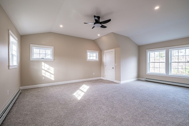 48 Highland Ave, Scarborough, ME 04074 - interior space with a baseboard heating unit, vaulted ceiling, carpet, and ceiling fan