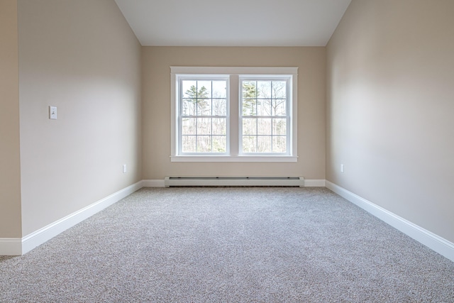 48 Highland Ave, Scarborough, ME 04074 - carpeted empty room with a baseboard heating unit and baseboards