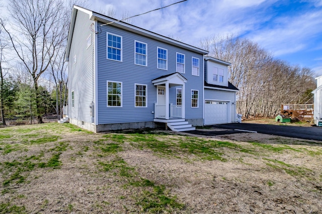 48 Highland Ave, Scarborough, ME 04074 - view of front of property with an attached garage and aphalt driveway