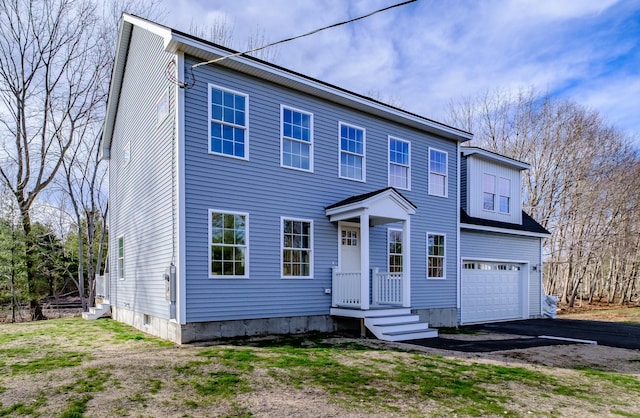 48 Highland Ave, Scarborough, ME 04074 - colonial inspired home with aphalt driveway and a garage