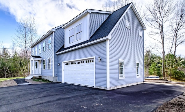 48 Highland Ave, Scarborough, ME 04074 - view of home's exterior with aphalt driveway and a garage
