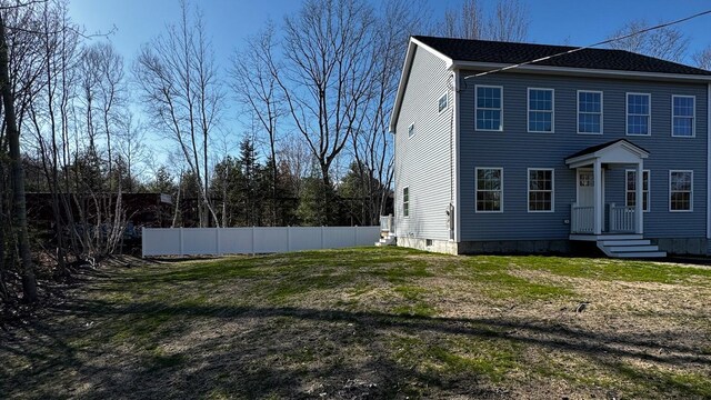 48 Highland Ave, Scarborough, ME 04074 - view of side of property featuring a lawn and fence