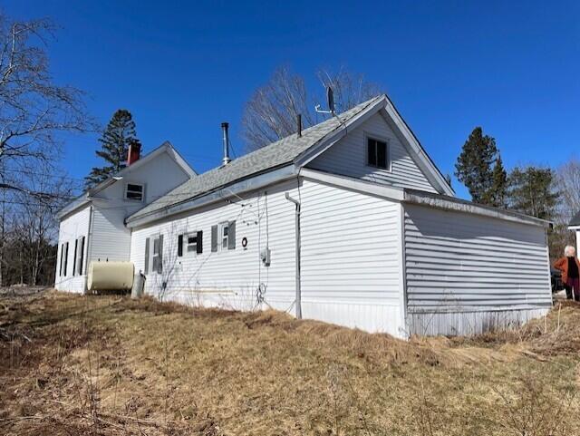 view of property exterior with heating fuel
