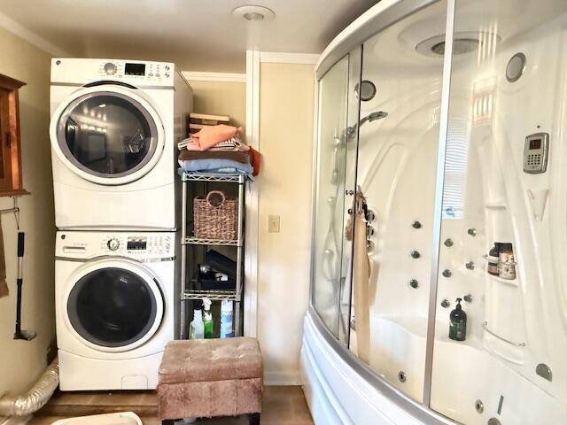 1361 Pleasant St, Blue Hill, ME 04614 - laundry area with stacked washer and clothes dryer