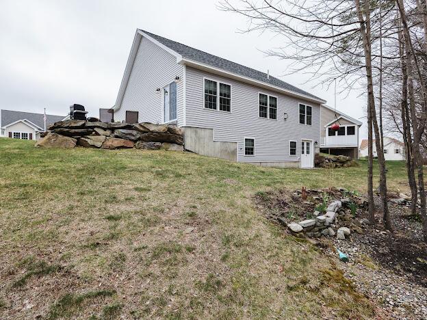 14 Connor Dr Unit 14, Gorham, ME 04038 - rear view of property with a lawn