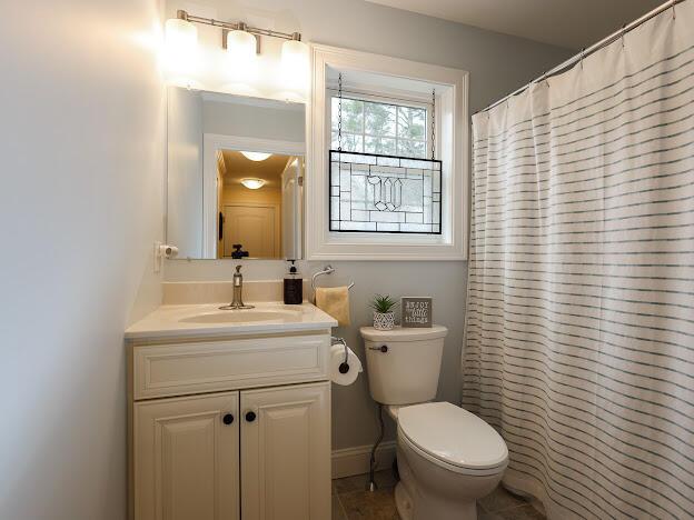 14 Connor Dr Unit 14, Gorham, ME 04038 - full bath with toilet, a shower with shower curtain, and vanity