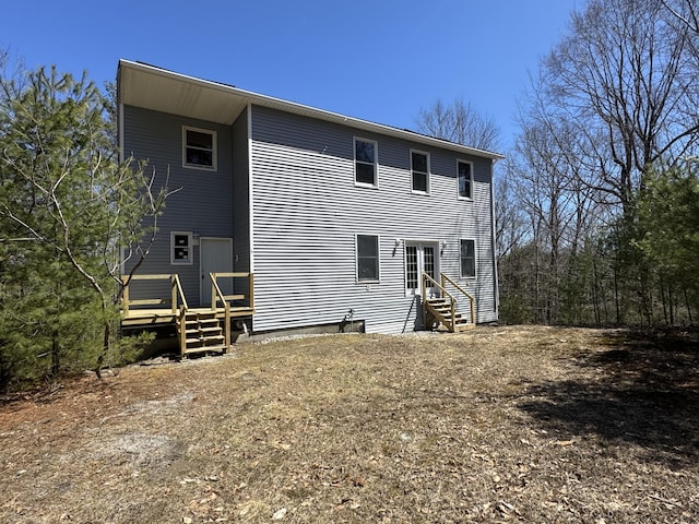 11 Dragonfly Dr, Windham, ME 04062 - rear view of house featuring entry steps