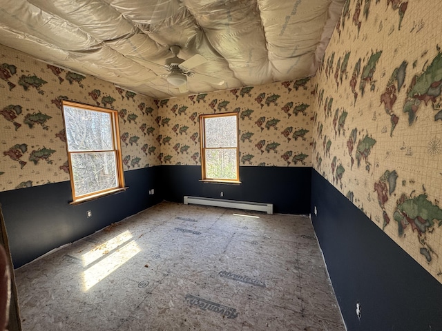 11 Dragonfly Dr, Windham, ME 04062 - unfurnished room with a ceiling fan, baseboard heating, and wallpapered walls