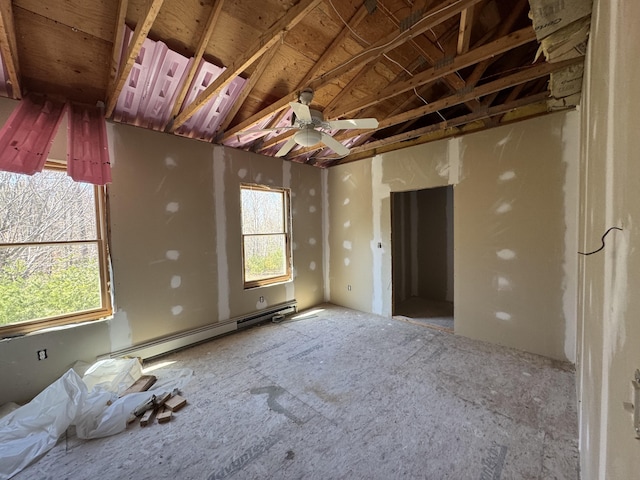 11 Dragonfly Dr, Windham, ME 04062 - unfurnished bedroom featuring vaulted ceiling, ceiling fan, and a baseboard heating unit