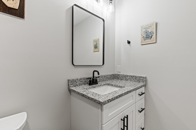 31 Neptune Dr, Brunswick, ME 04011 - bathroom featuring vanity and toilet