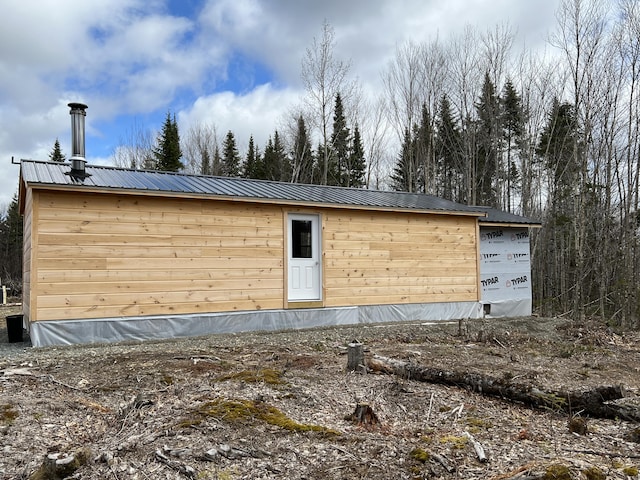 view of outbuilding featuring an outdoor structure