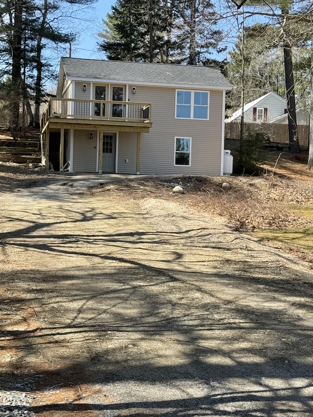 54 Boulder Rd, Raymond, ME 04071 - view of front facade with a deck