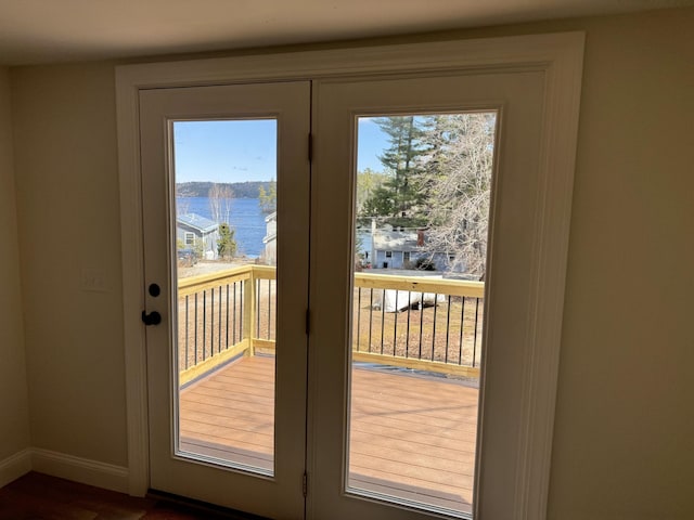 54 Boulder Rd, Raymond, ME 04071 - entryway with baseboards and wood finished floors