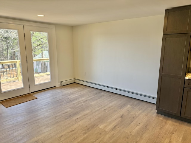 54 Boulder Rd, Raymond, ME 04071 - empty room featuring light wood-style floors, baseboard heating, and recessed lighting