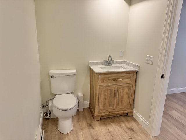 54 Boulder Rd, Raymond, ME 04071 - half bath featuring wood finished floors and vanity