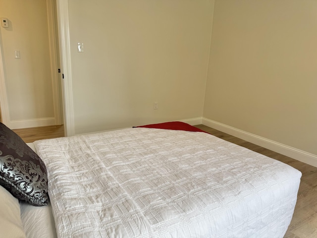 54 Boulder Rd, Raymond, ME 04071 - bedroom featuring baseboards and wood finished floors