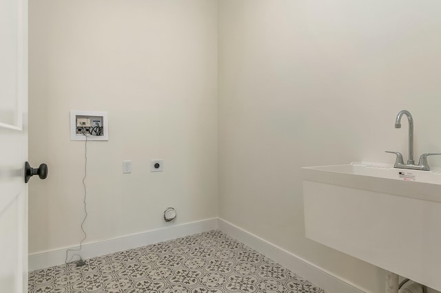 37 Cascade Cir Unit 26, Kennebunk, ME 04043 - washroom with electric dryer hookup, baseboards, laundry area, and hookup for a washing machine
