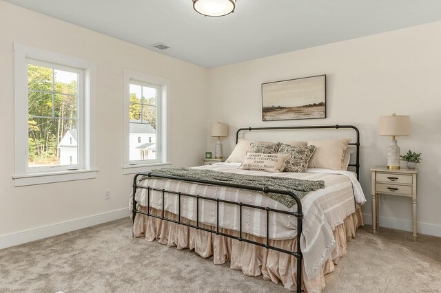37 Cascade Cir Unit 26, Kennebunk, ME 04043 - bedroom featuring light carpet, visible vents, and baseboards