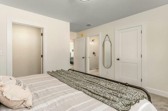 37 Cascade Cir Unit 26, Kennebunk, ME 04043 - bedroom with ensuite bath, carpet floors, visible vents, and baseboards