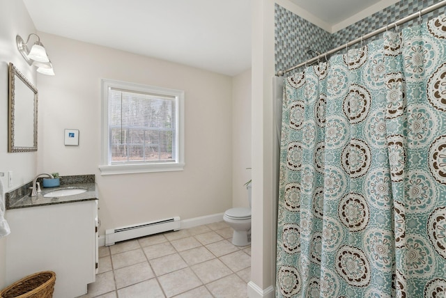 bathroom featuring tile patterned flooring, baseboards, a baseboard radiator, vanity, and toilet