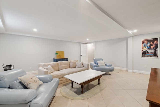 living area featuring baseboards, recessed lighting, and light tile patterned floors