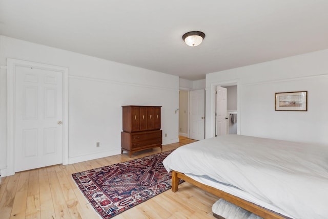 bedroom featuring light wood finished floors
