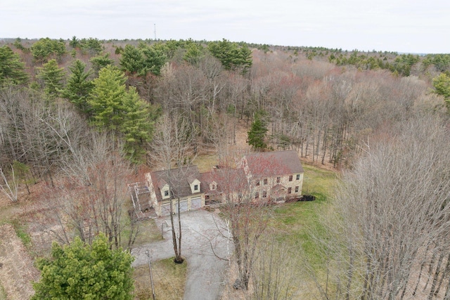 aerial view with a wooded view