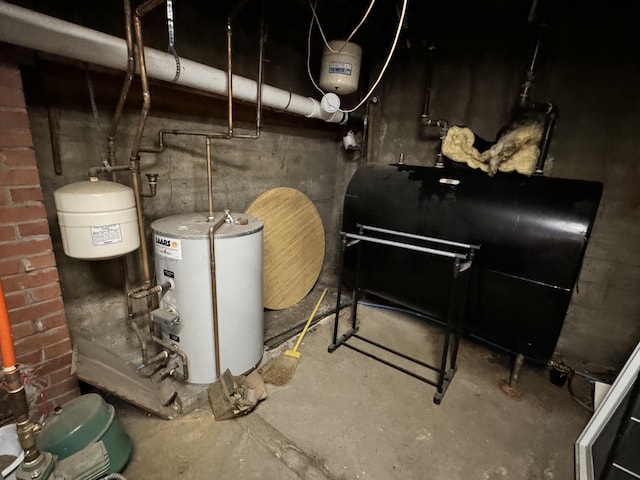 334 Main St, Madawaska, ME 04756 - utility room featuring oil tank and water heater
