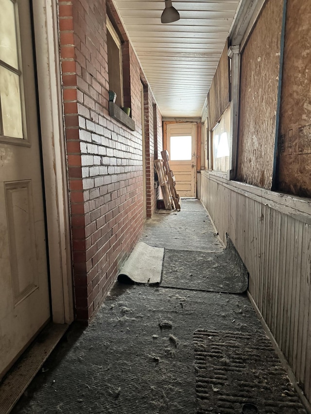 334 Main St, Madawaska, ME 04756 - hall featuring brick wall