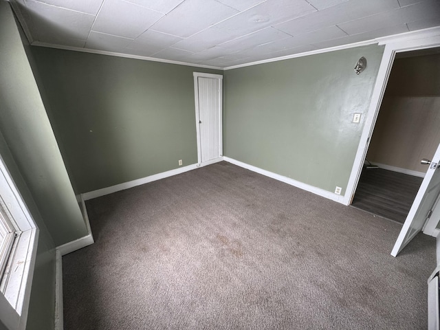 334 Main St, Madawaska, ME 04756 - unfurnished bedroom featuring crown molding, carpet floors, and baseboards
