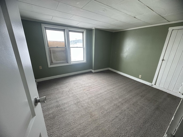 334 Main St, Madawaska, ME 04756 - empty room with carpet flooring and baseboards
