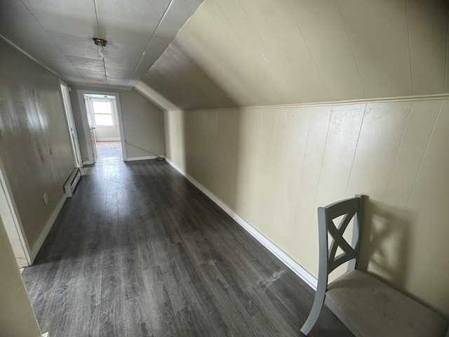 334 Main St, Madawaska, ME 04756 - bonus room with a baseboard heating unit, dark wood-type flooring, lofted ceiling, and baseboards