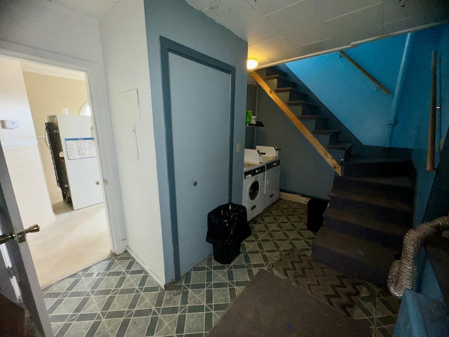 334 Main St, Madawaska, ME 04756 - staircase featuring washer / dryer