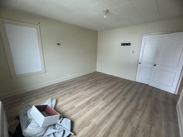 334 Main St, Madawaska, ME 04756 - unfurnished room featuring wood finished floors and baseboards