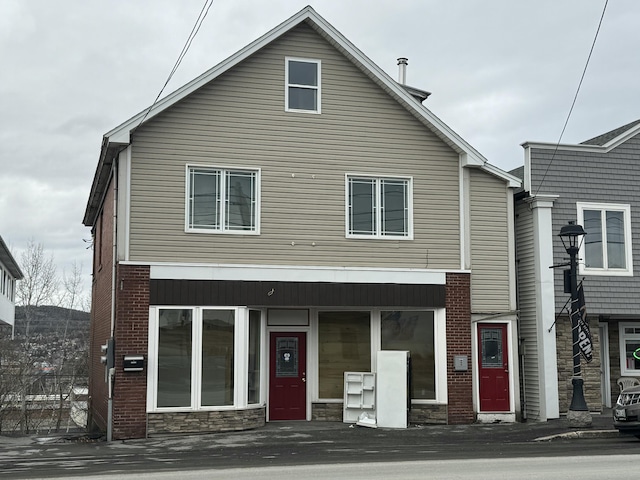 334 Main St, Madawaska, ME 04756 - view of front of home with stone siding