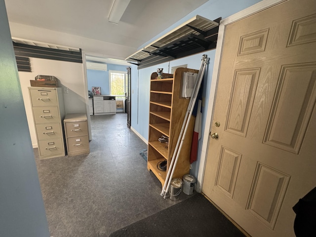 334 Main St, Madawaska, ME 04756 - basement featuring baseboards and dark floors