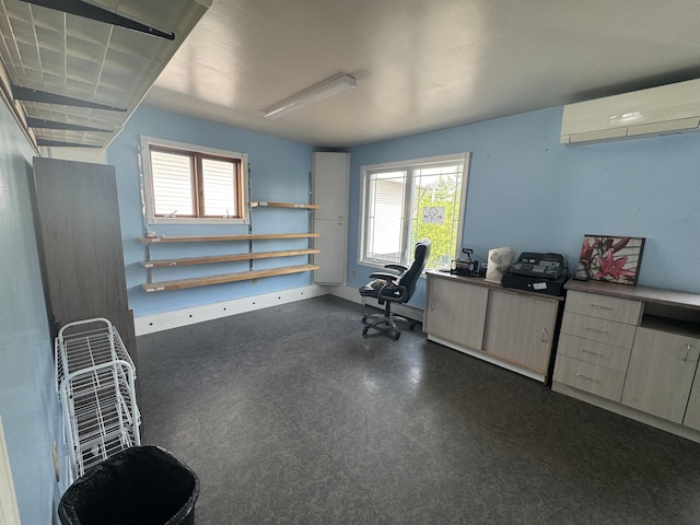 334 Main St, Madawaska, ME 04756 - miscellaneous room featuring an AC wall unit, plenty of natural light, and an office area